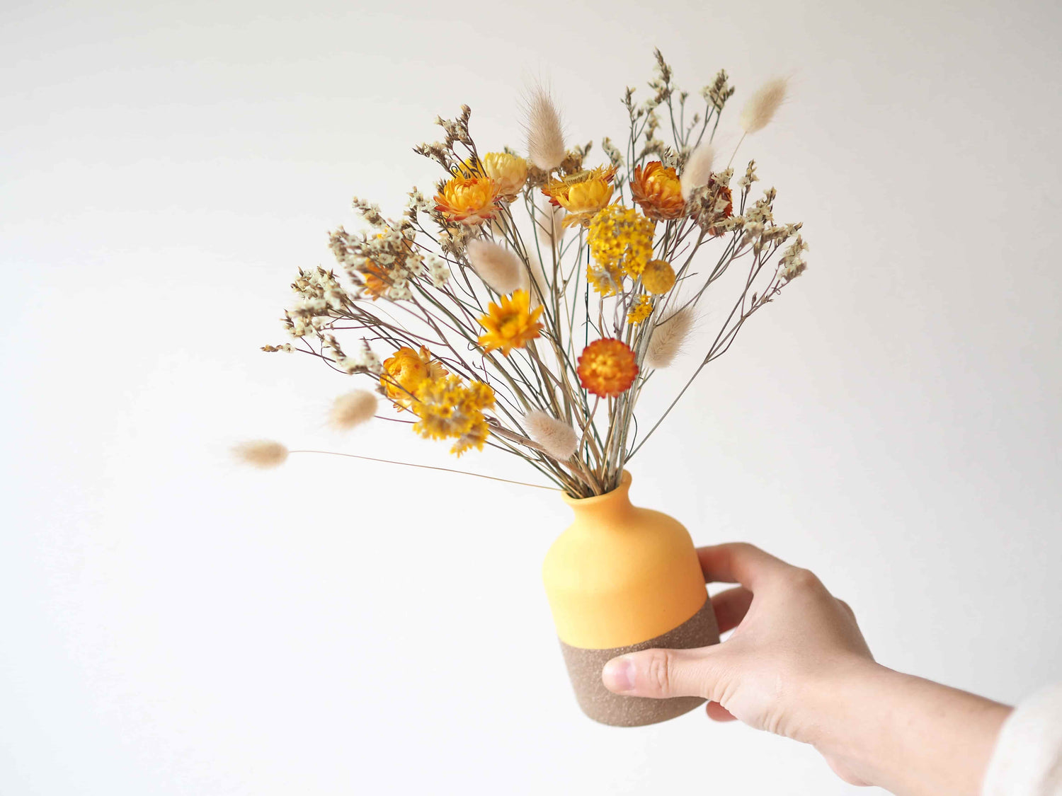 LULU - dried yellow strawflowers in a yellow vase