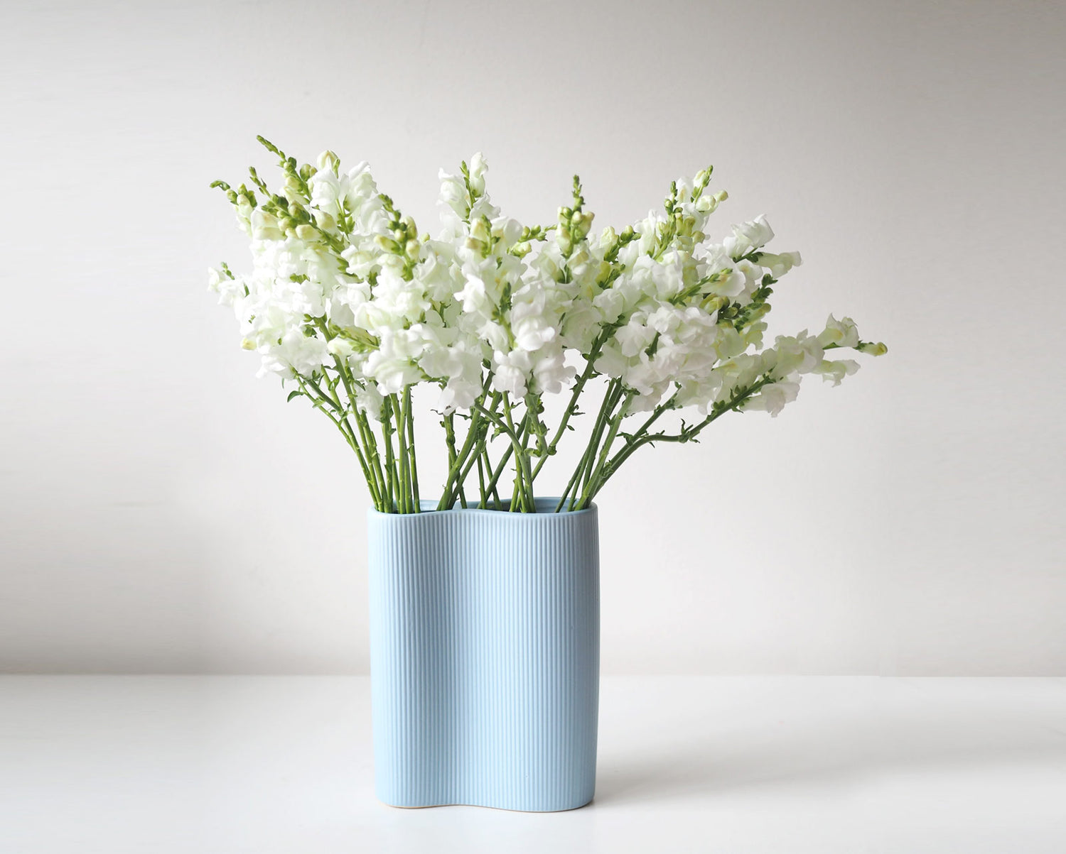 AZUREA - Large Curvy Ceramic Vase in Matte Blue