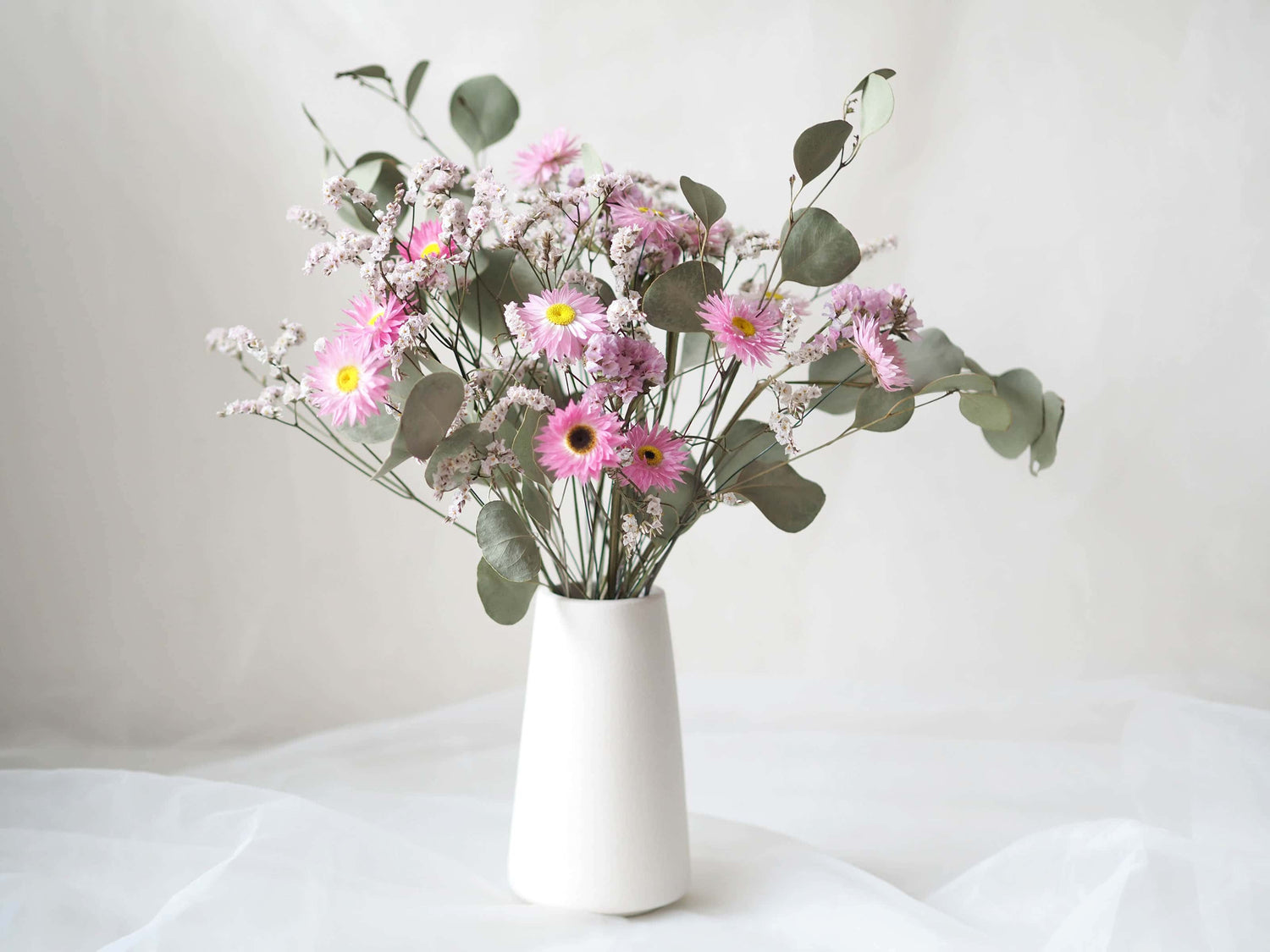 ZURI – native Australian dried flowers in a tall white ceramic vase